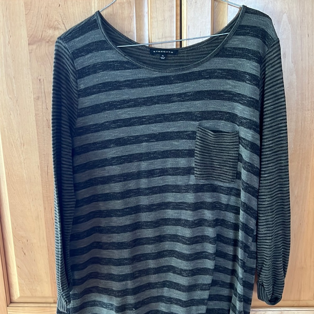 Light, striped olive green material. Perfect for Fall weather!